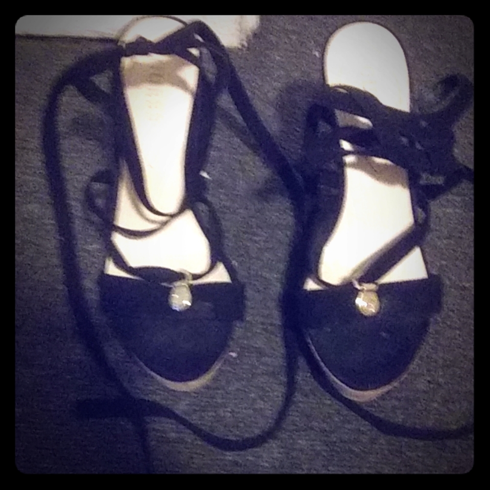 A pair of guess wedge heels